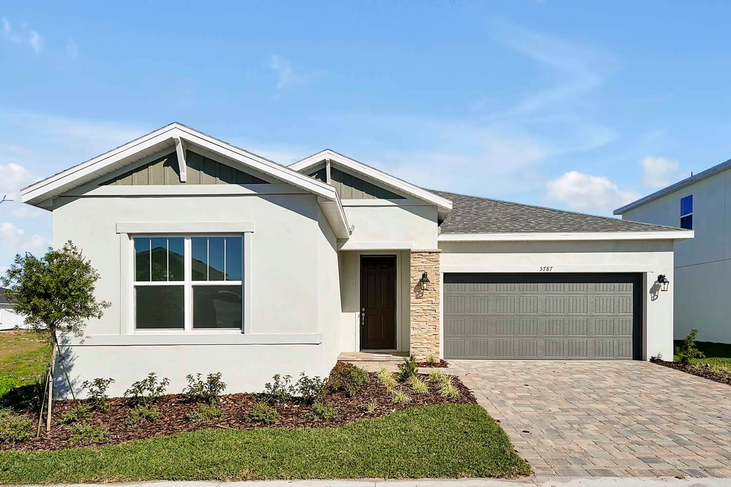 New Tampa Single Family Home Quick Possession Hawthorne in Prairie Oaks, located at 5787 Greenery Lane, St. Cloud, FL Built By Cardel Homes 