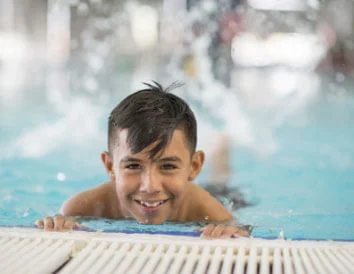 Boy In Swimming Pool