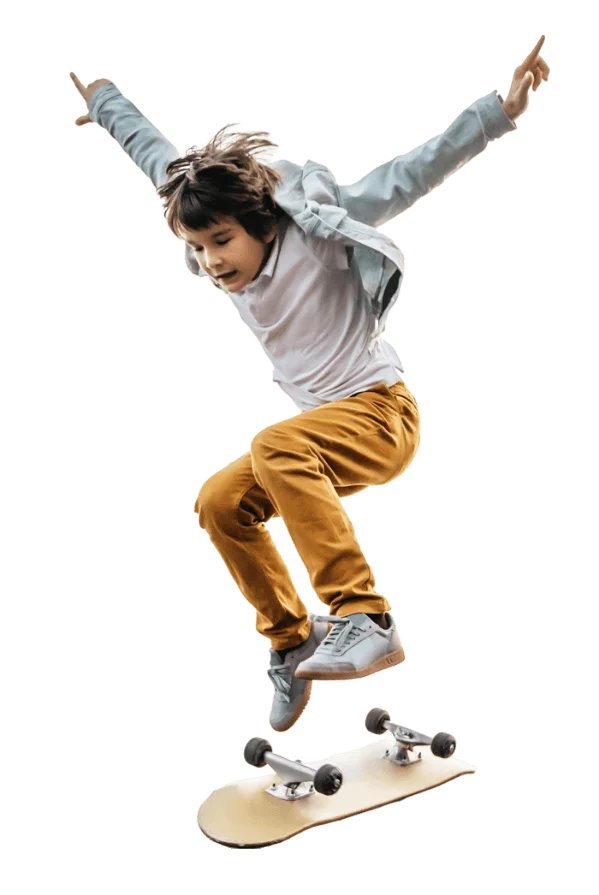 A boy doing a trick on a skateboard