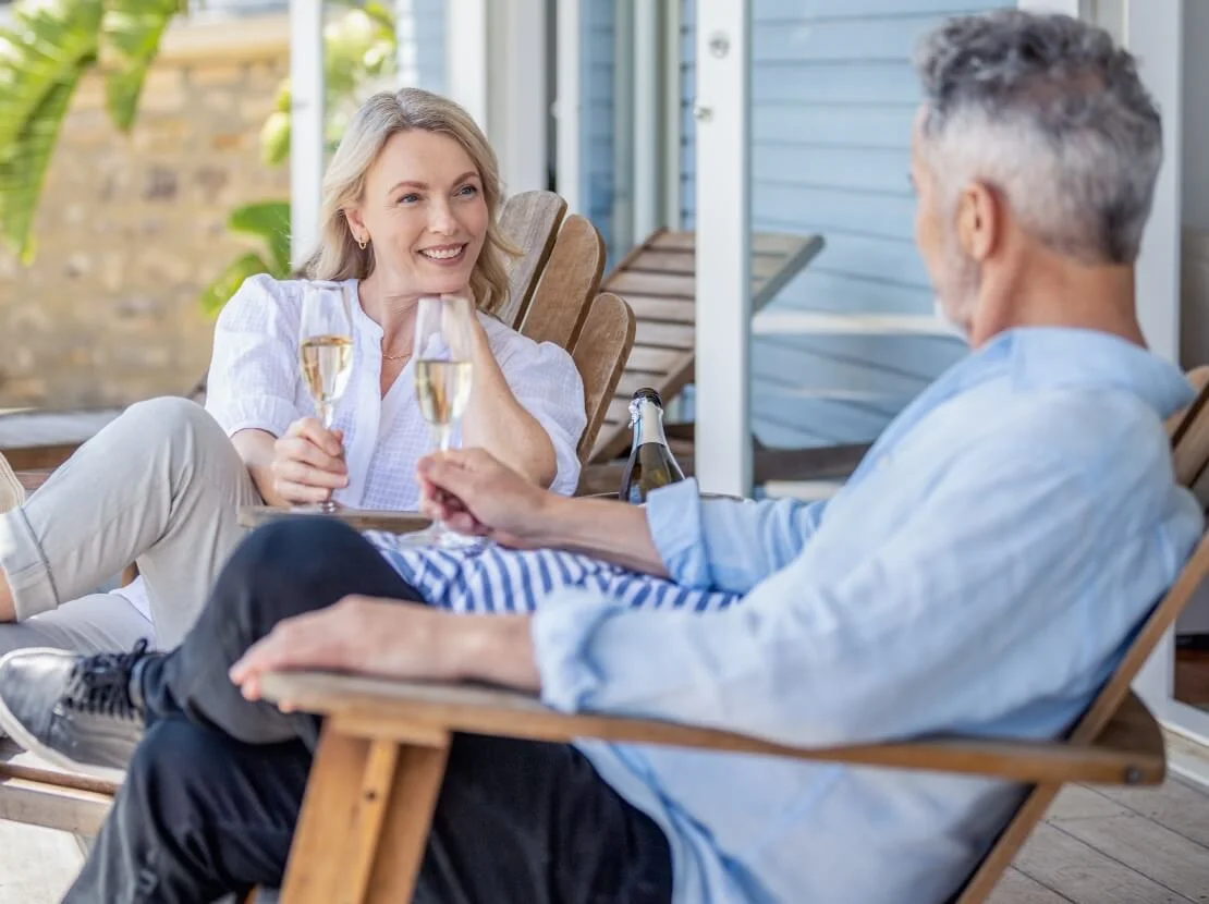Couple drinking on outdoor patio